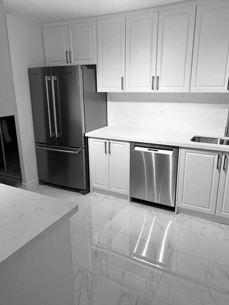 Desa Contracting, Restoration, and Janitorial Services renovated a modern, usable kitchen with clean quartz surfaces in Scarborough,Toronto.