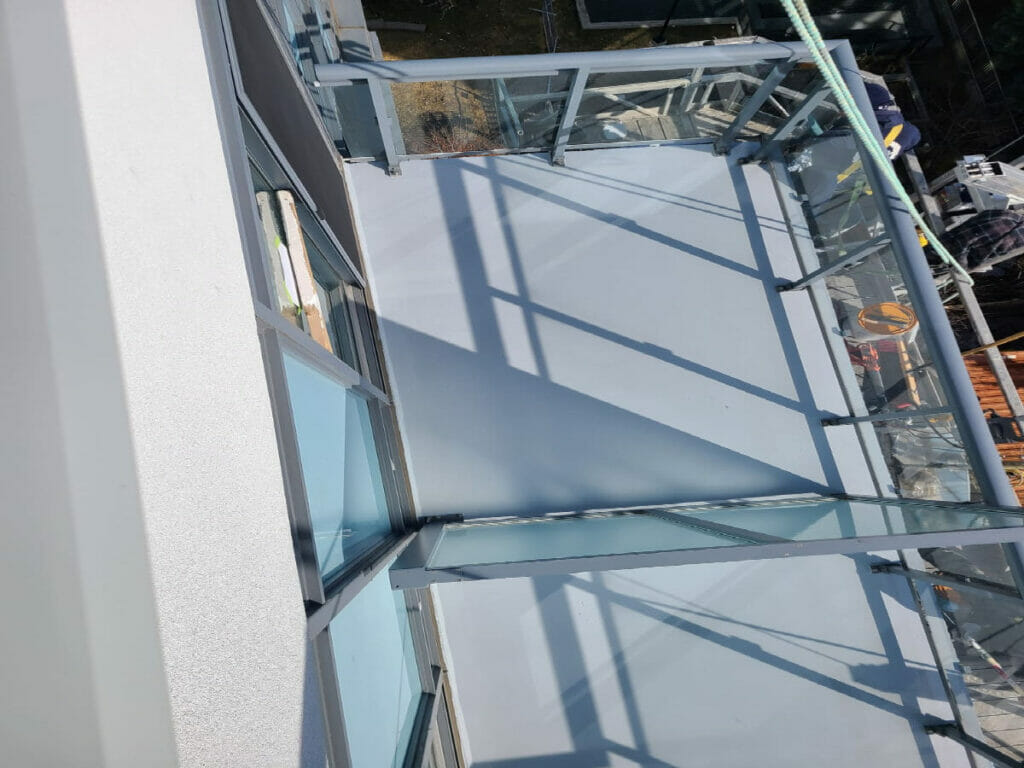 The Staff Desa Contracting, Restoration, and Janitorial Services can be seen at work on the top angle view of a refurbished balcony of a building at Kenestan.