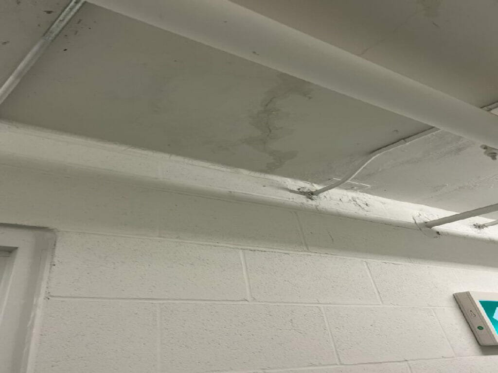 This image captures a crack in the wall of a Toronto condo, extending to the ceiling, necessitating water restoration services provided by Desa Contracting and Restoration.
