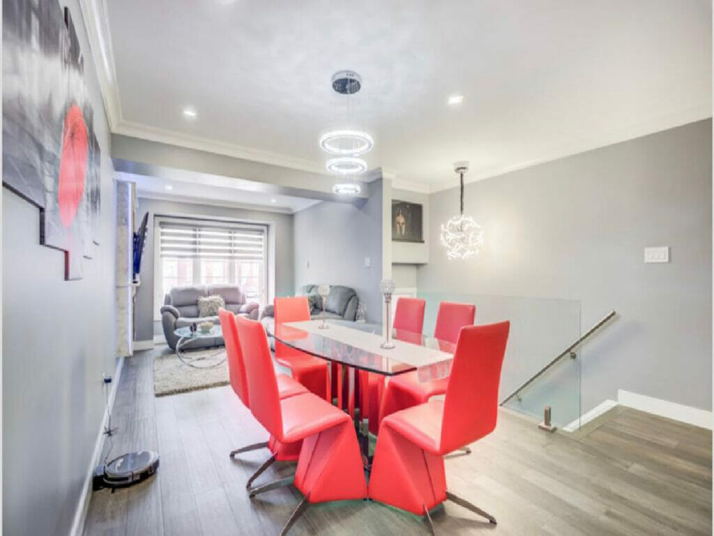 Desa contracting and restoration completed a Toronto house improvement project that included a new floor, renovated table and chairs, a ceiling chandelier, and potlights.