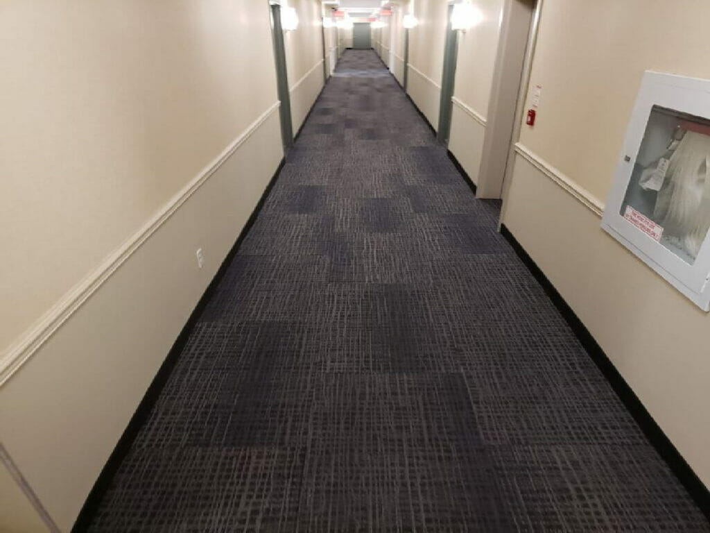 Showcasing the carpet in the hallway after Desa Contracting Restoration and Janitorial Service renovated the Toronto property.