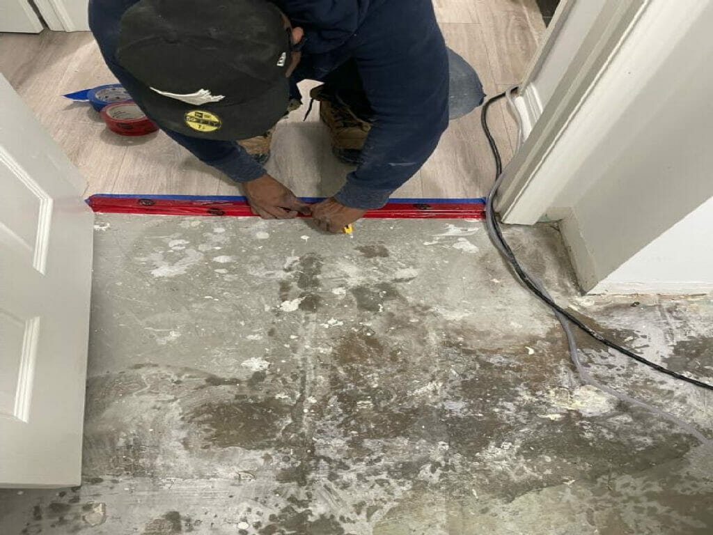 Desa Contracting, Restoration, and Janitorial Services Expert working on water damaged area trying to remove molds at Lawrence Avenue. West Toronto